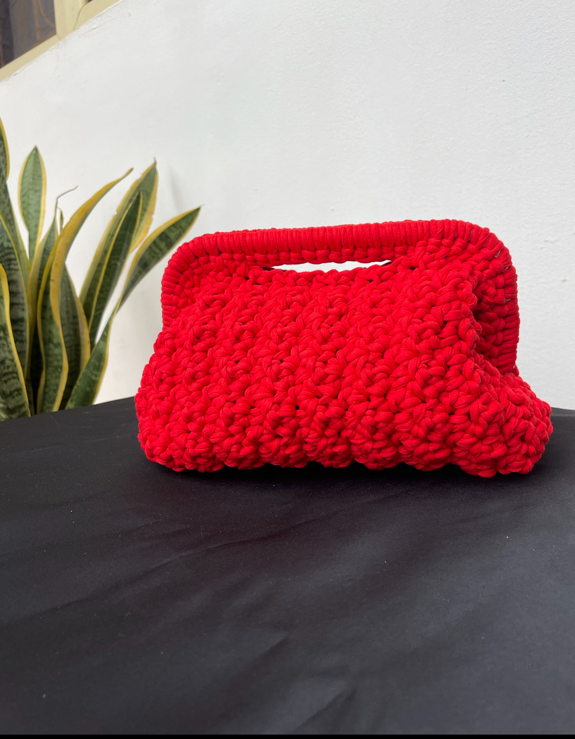 EGO clutch in Pepper red